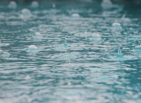 rain-falling-into-water