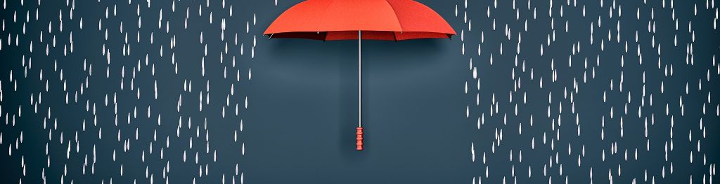 Raindrops falling onto and around a red umbrella on a dark blue background.
