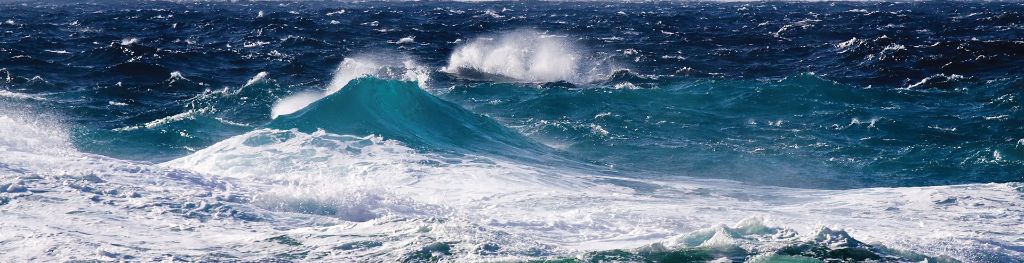 Stormy ocean waves breaking