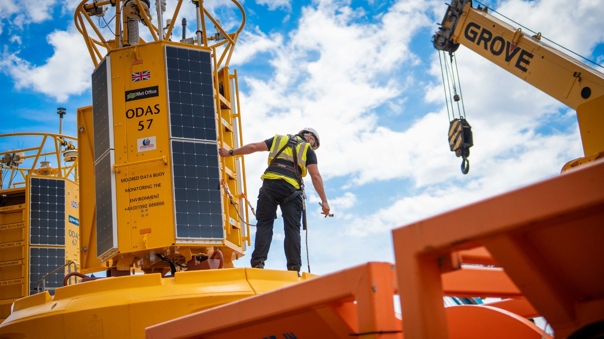 An image showing an engineer on a marine buoy