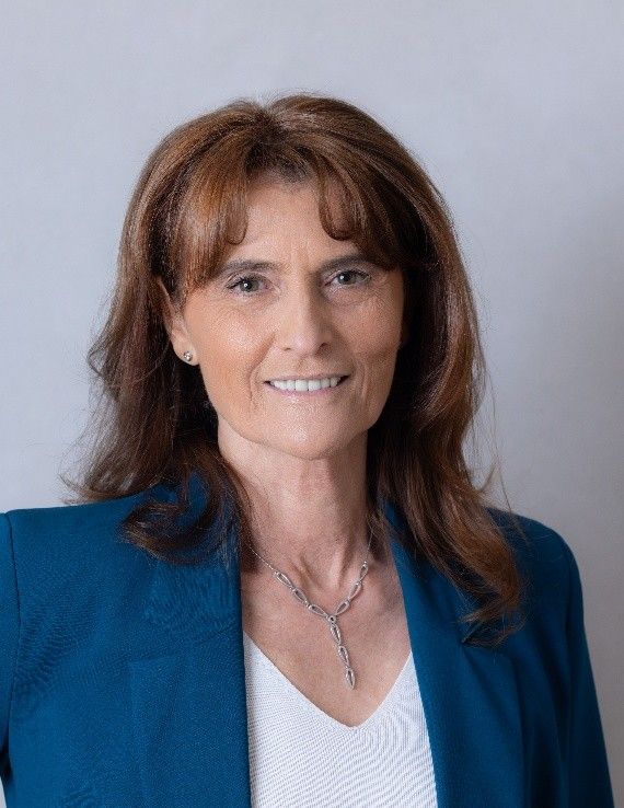 Head and shoulders image of Florence Rabier wearing a blue jacket and white top.