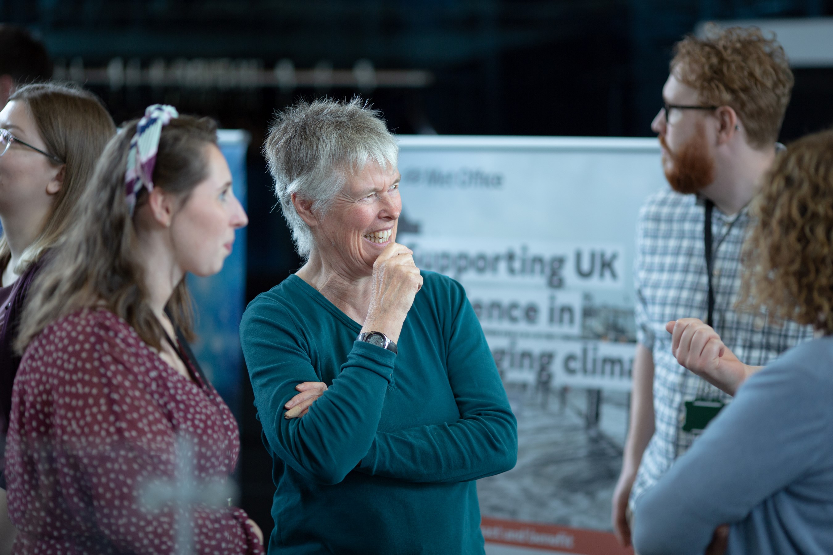 People having a positive discussion at the Met Office HQ