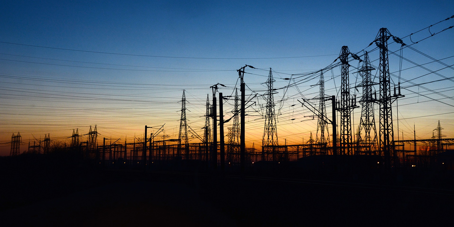 Electricity pylons at night